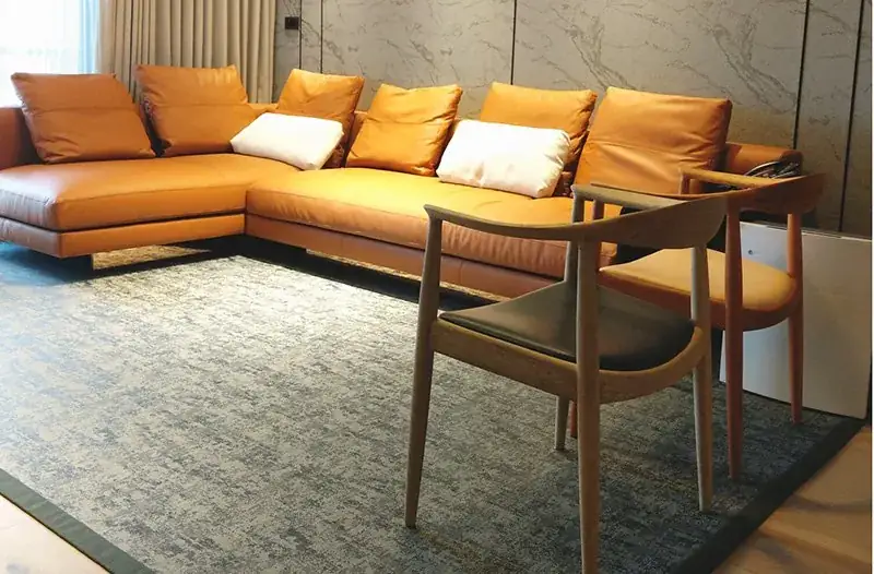 Living room with a texlymat woven vinyl rug