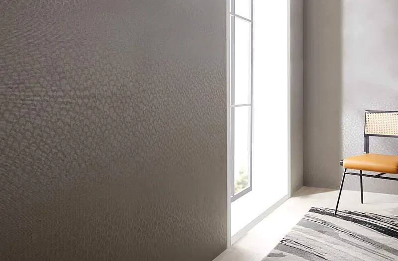 Woven vinyl wallcovering in a fine textured weave, installed on an interior wall