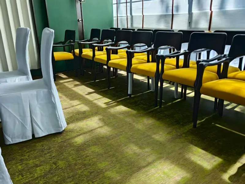 Meeting room seating on woven vinyl flooring